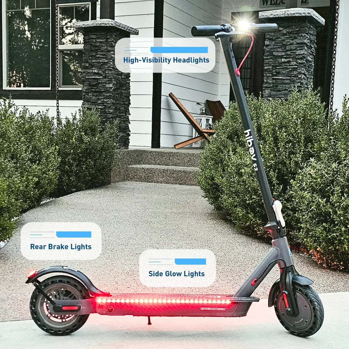 Electric scooter with LED headlights, rear brake lights, and side glow lights on a walkway