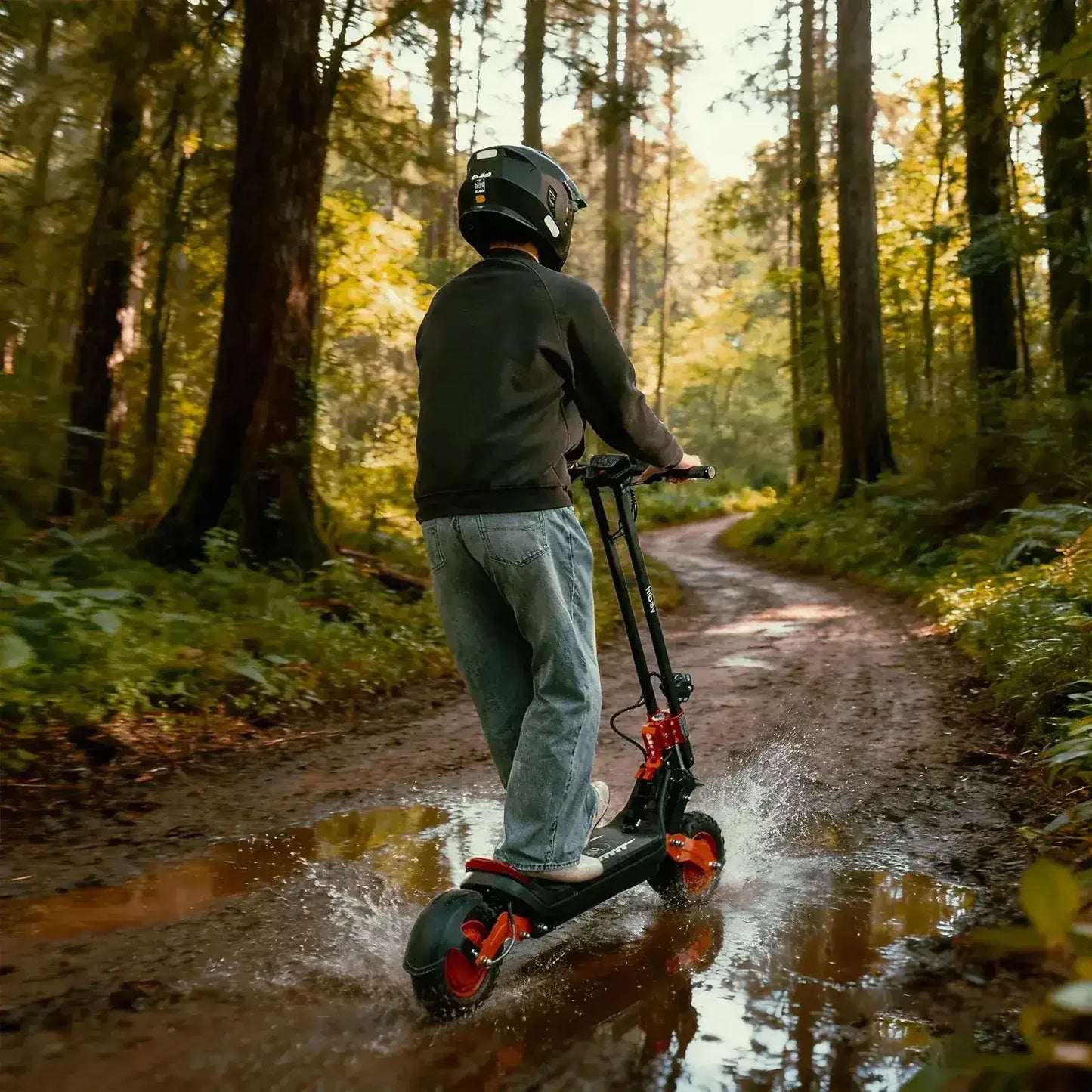 Man riding an electric scooter on a muddy forest trail with water splashes