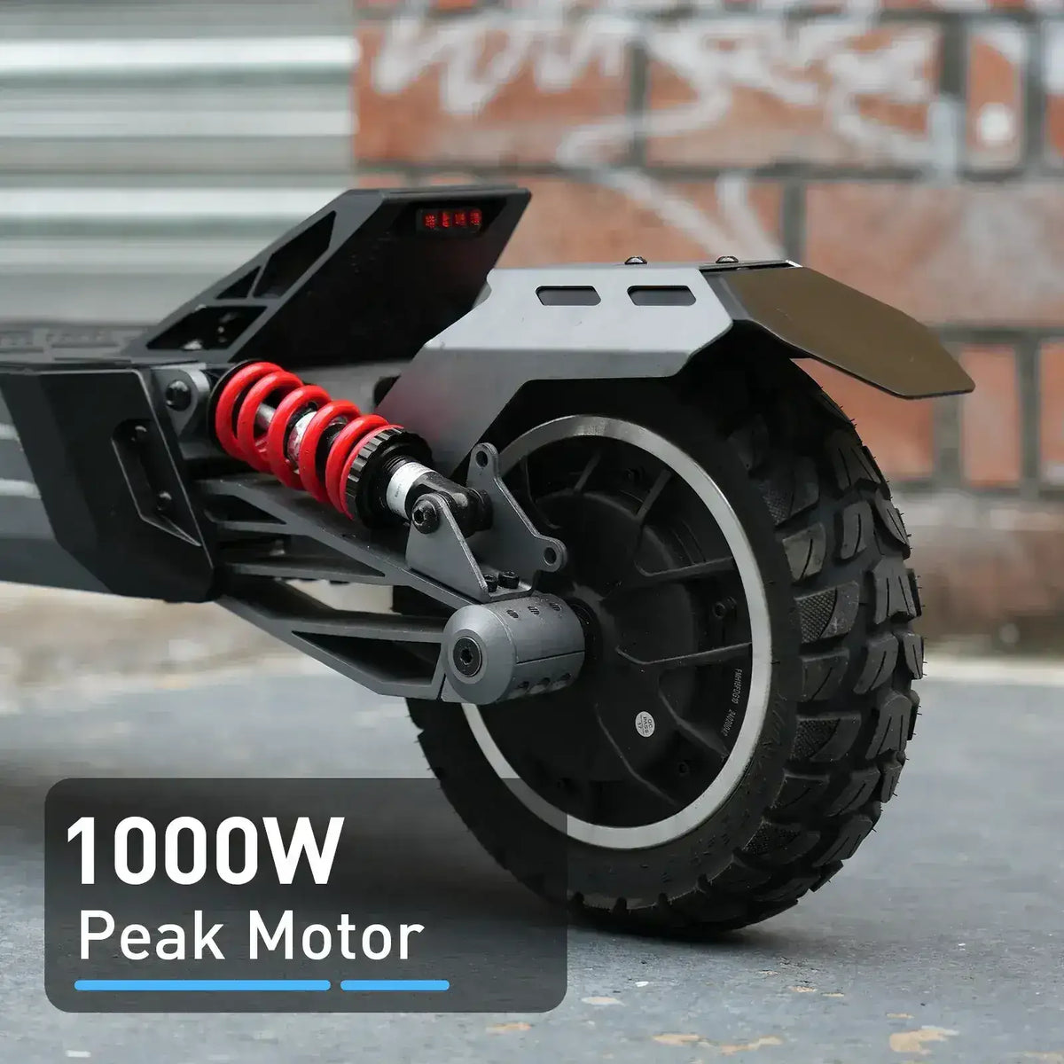 Electric scooter rear wheel with suspension and 1000W peak motor on urban background