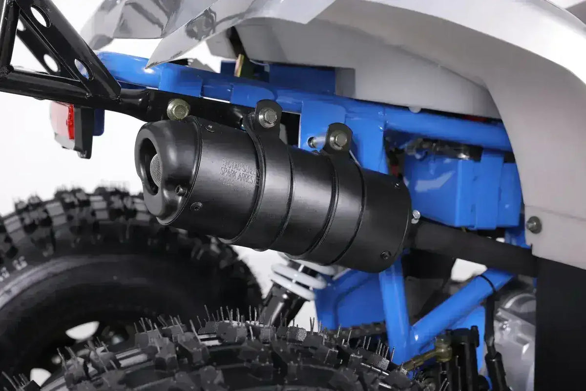 Close-up of youth ATV exhaust and tire, Q9 PowerSports USA kid-friendly vehicle detail