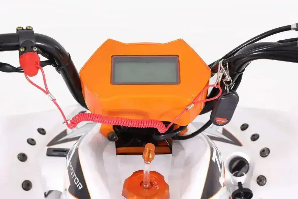 Close-up of ATV handlebar dashboard with orange digital display and ignition keys