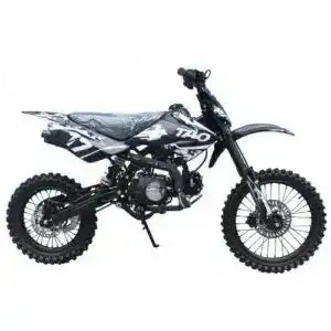 Black and white dirt bike with off-road tires, viewed from the side on a white background