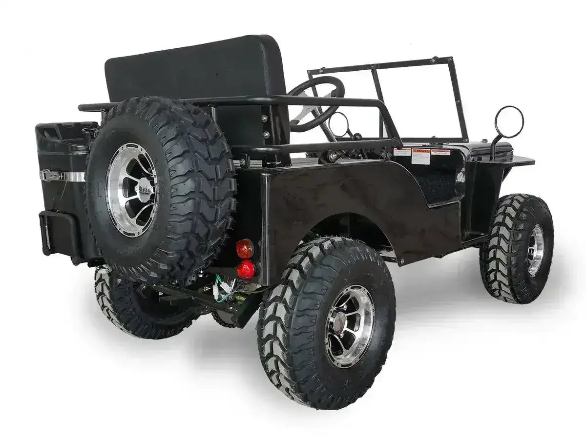 Black Willys-style go-kart showing rear spare tire, bench seat and round taillights, rear three-quarter view