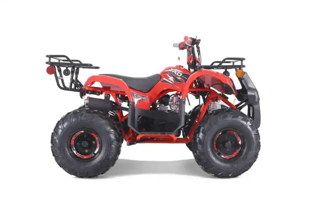 Red all-terrain ATV with rugged tires and cargo racks on a white background