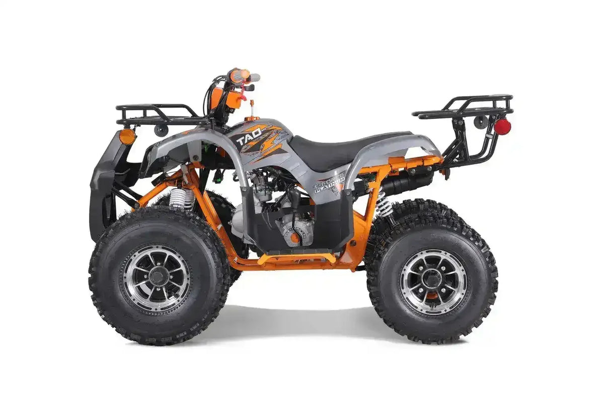 Gray and orange youth ATV side view, rugged tires, shown for sale at Q9 PowerSports USA