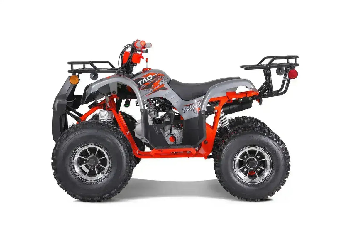 Gray and red youth ATV with rugged tires, side view, from Q9 PowerSports USA