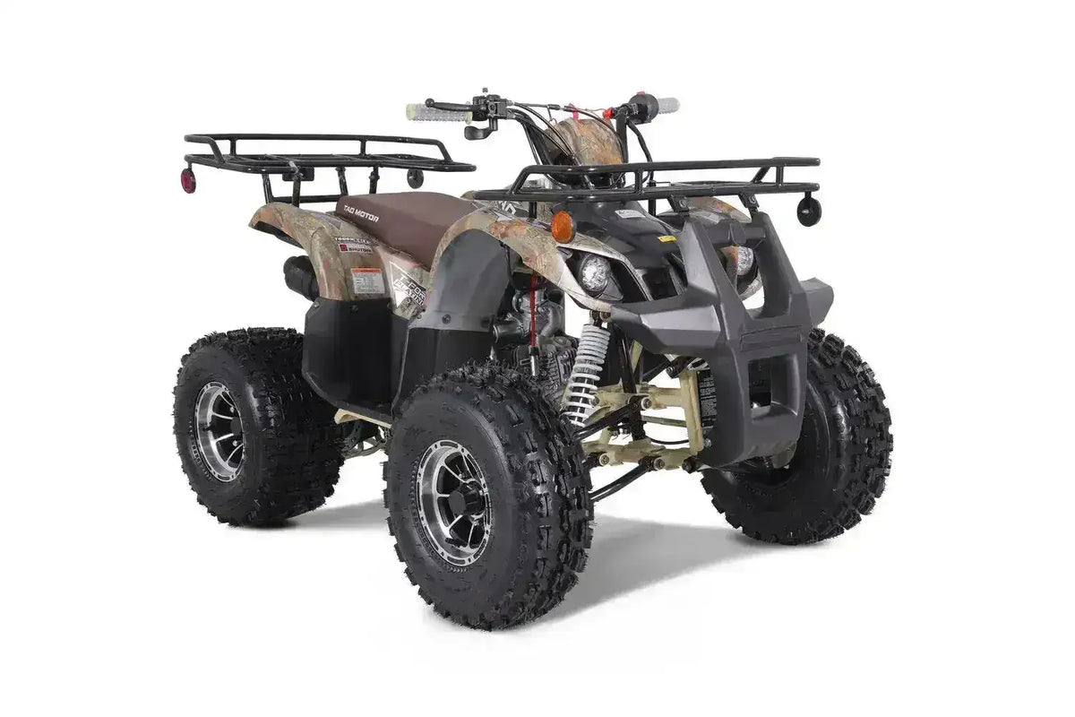 Youth ATV with rugged tires, camouflage body, and front rack from Q9 PowerSports USA