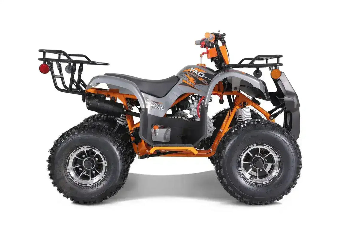 Dark gray and orange youth ATV with rugged tires at Q9 PowerSports USA for kids and teens