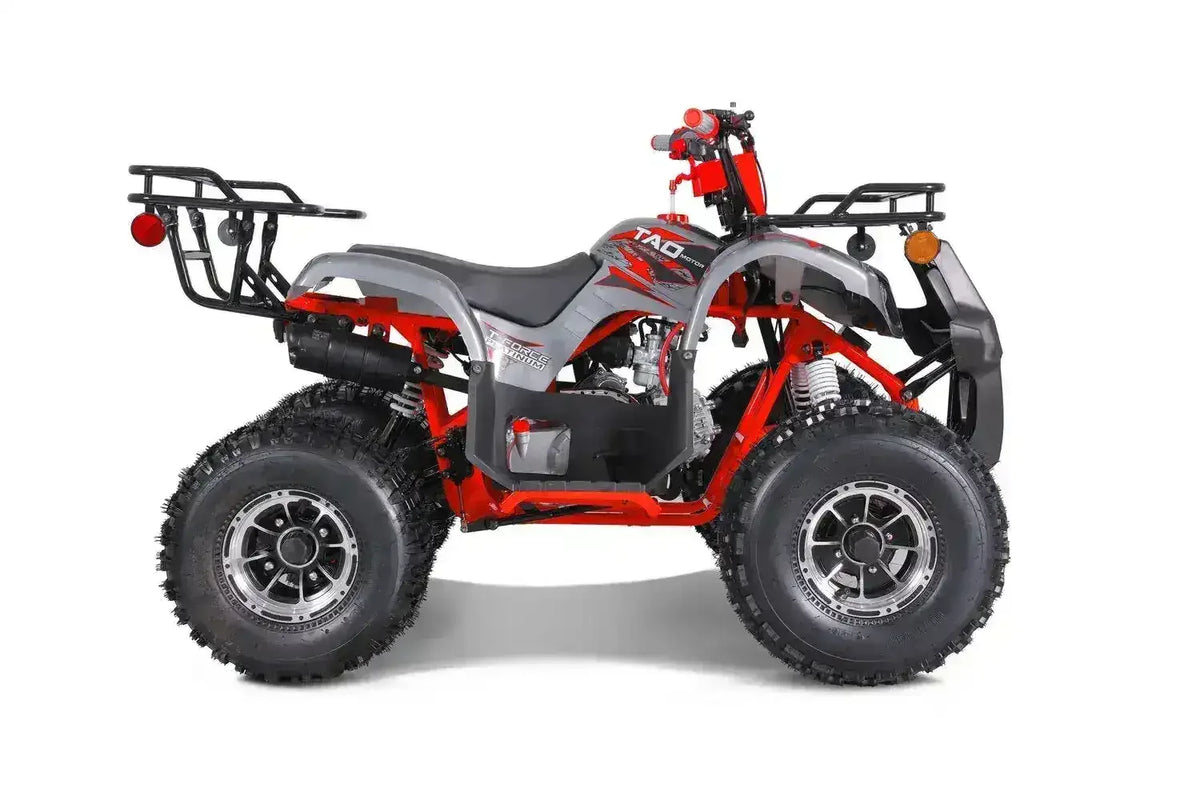 Dark gray and red youth ATV with rugged tires, featured by Q9 PowerSports USA.