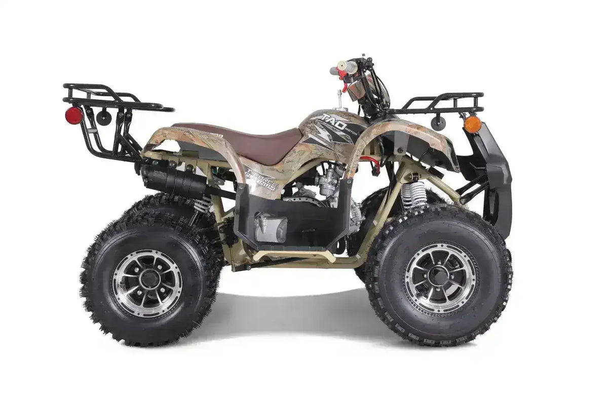 Youth ATV in camouflage design with rugged tires, for sale at Q9 PowerSports USA