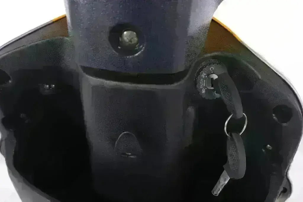 Close-up of Q9 PowerSports classic 50cc scooter ignition switch with key inserted