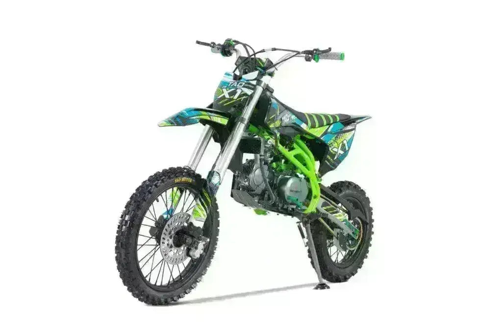 Green 140cc DBX1 off-road dirt bike with knobby tires from Q9 PowerSports USA on white background