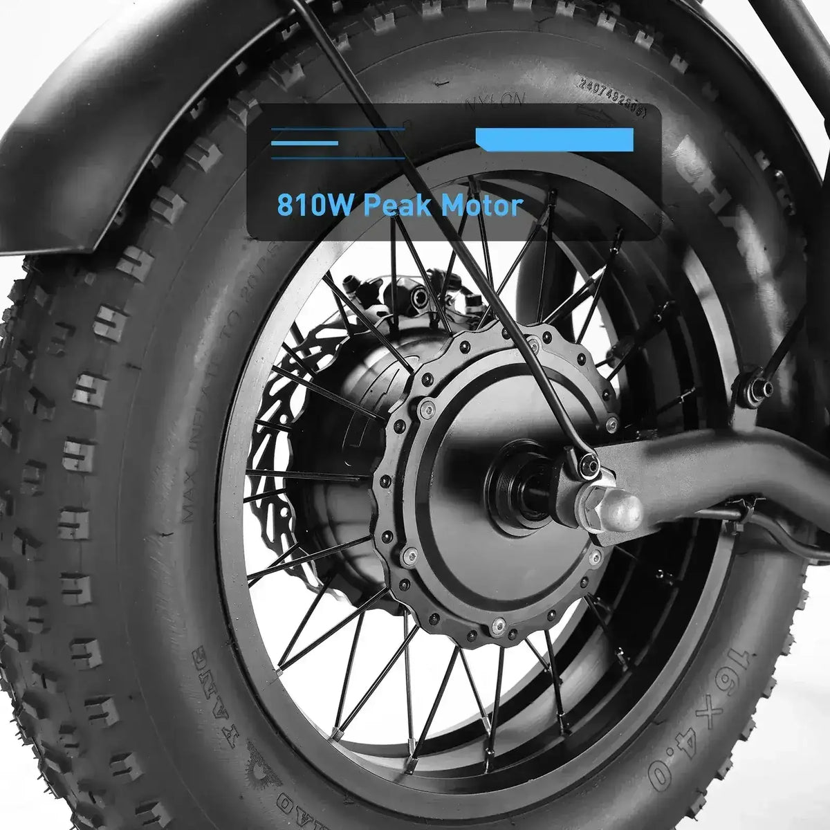 Close-up of electric scooter rear wheel with 810W peak motor and fat tire.