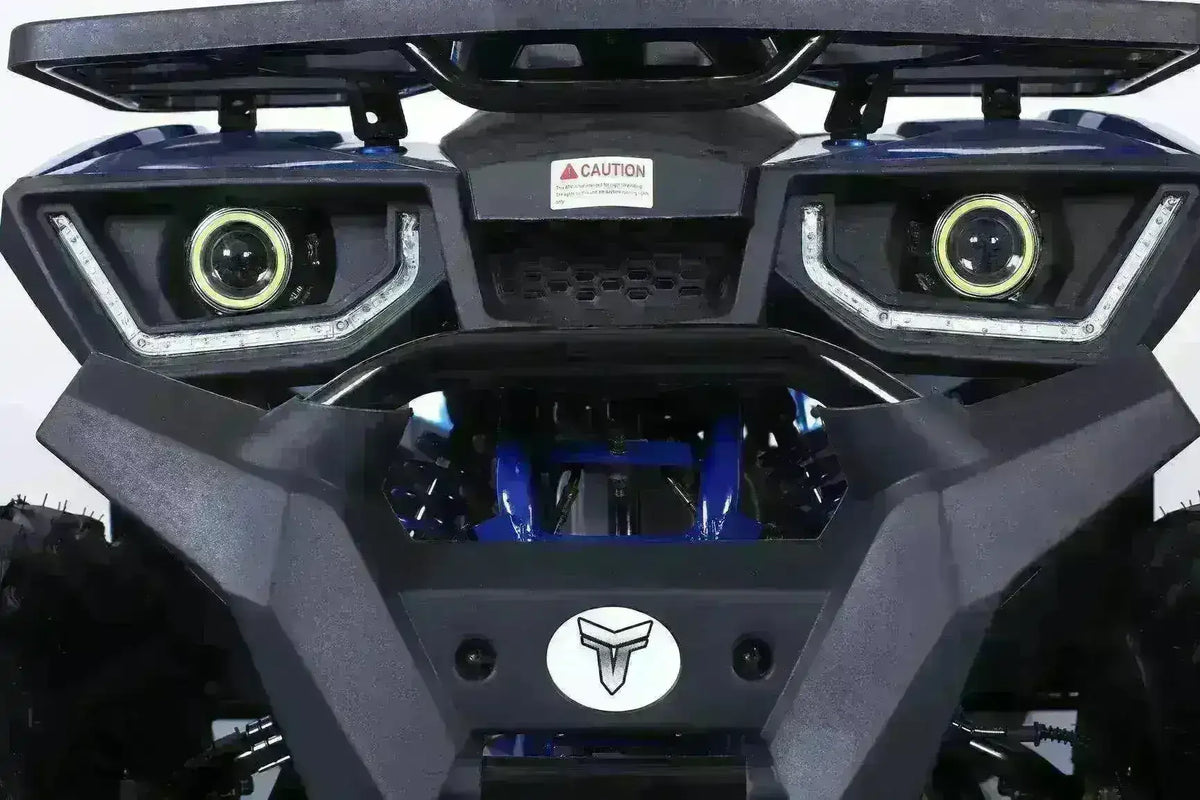 Front view of a utility ATV with LED headlights and rugged bumper design