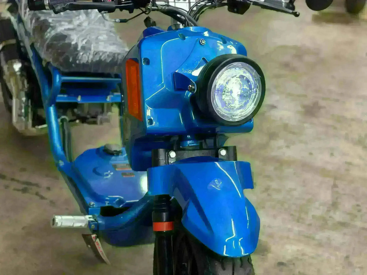 Blue Maddog 150cc scooter with round headlight at Q9 PowerSports USA showroom