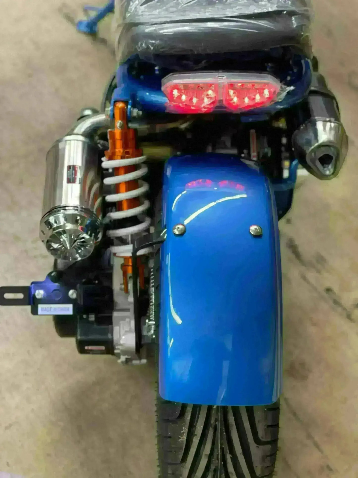 Rear view of blue Maddog 150cc scooter with LED tail light at Q9 PowerSports USA
