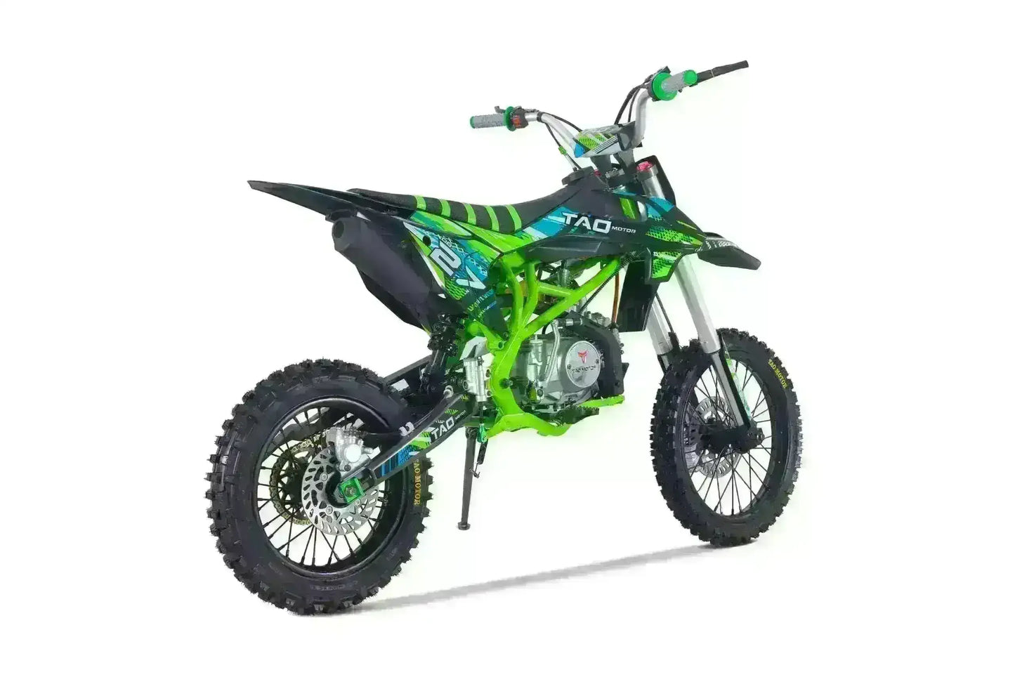 Green 125cc youth dirt bike with knobby tires and bold graphics, ideal for off-road riding.
