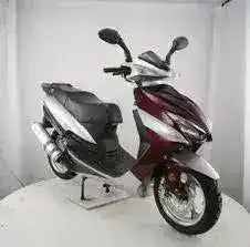 Red and silver 150cc adventure scooter with sporty design in a studio setting