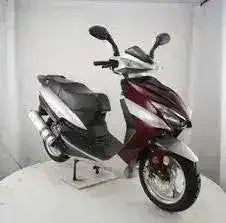 Red and silver 150cc adventure scooter with sporty design in a studio setting
