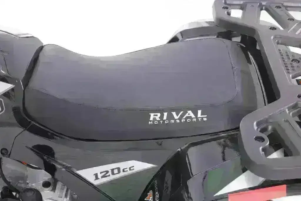 Close-up of Rival Motorsports 120cc youth utility ATV seat and rear cargo rack