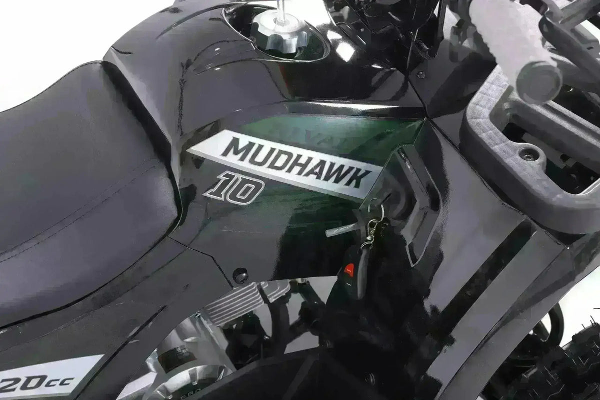 Close-up of Mudhawk 10 125cc black youth utility ATV showing seat, key, and handlebar