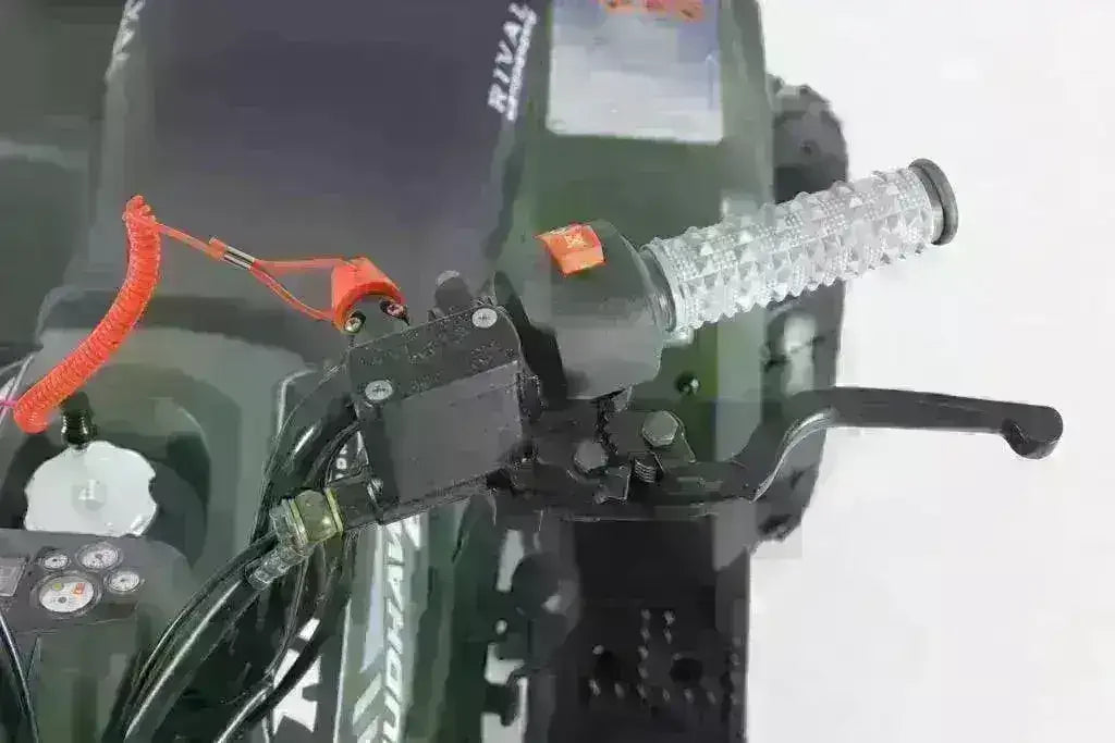 Close-up of kids ATV handlebar with safety tether, controls, and textured grip