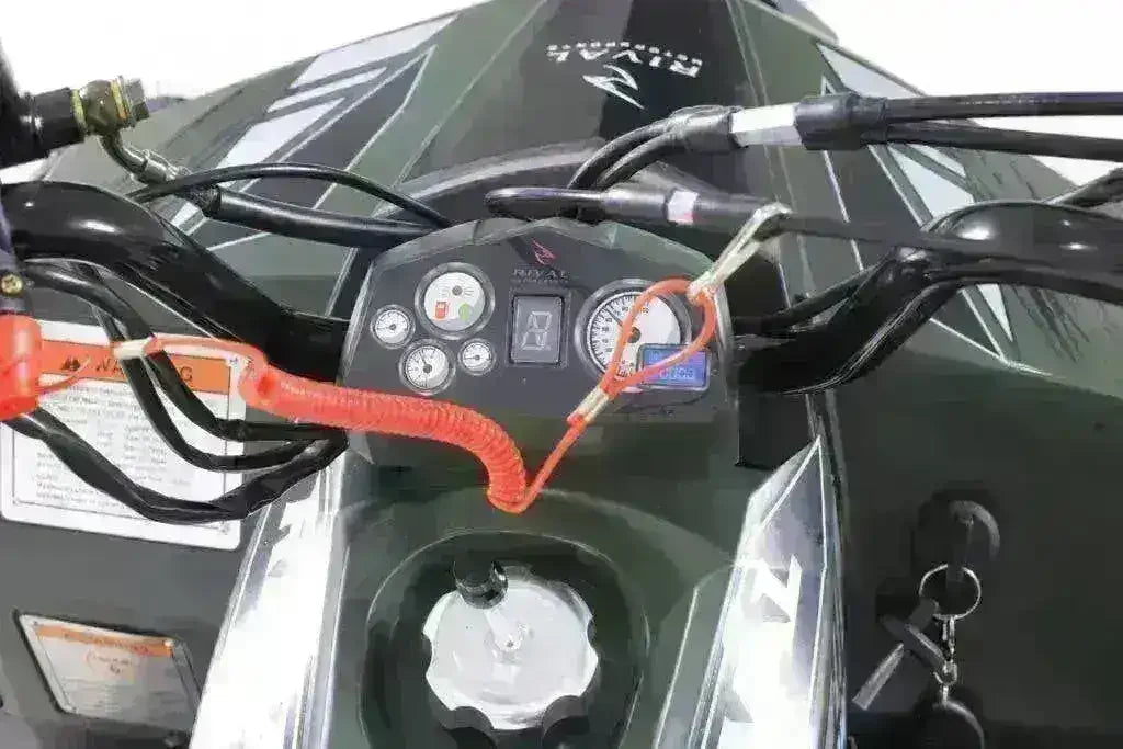 Kids ATV dashboard view with controls, speedometer, and safety tether