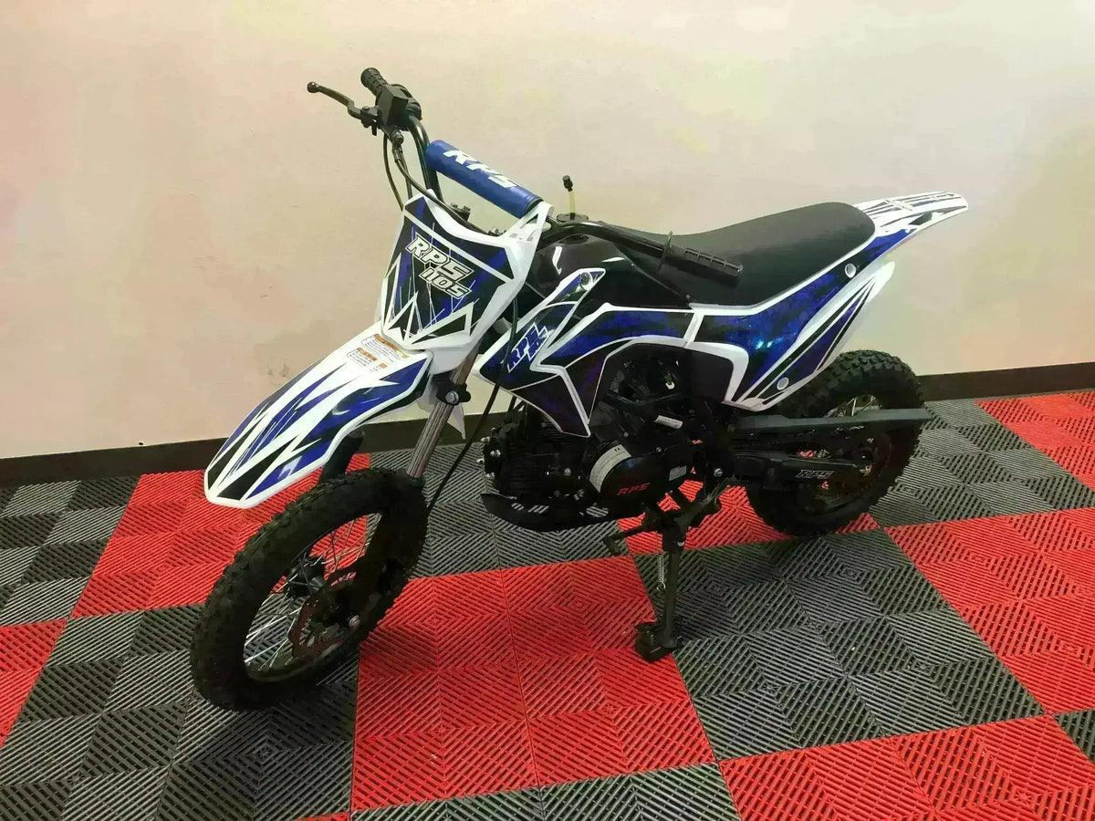 Blue and white RPS 110cc dirt bike with knobby tires on red and gray showroom floor