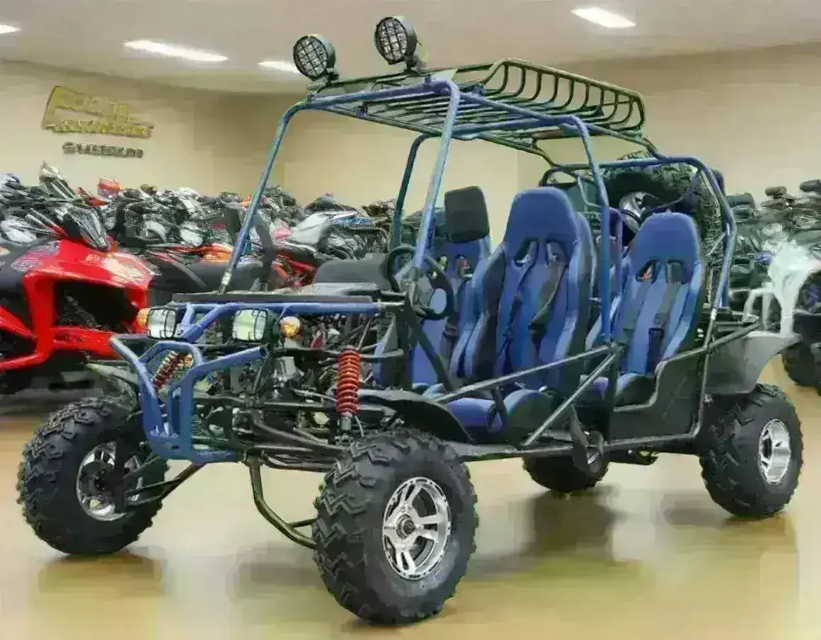 Four-seat 200cc go-kart with blue seats and off-road tires in a showroom setting.