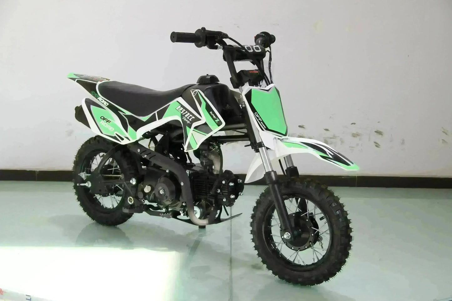 Green and black 70cc kids dirt bike with training wheels from Q9 PowerSports USA