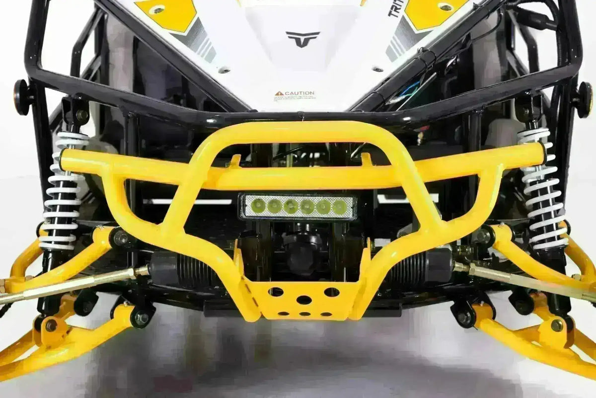 Front close-up of the Triton go-kart yellow bumper, rectangular light and white suspension springs