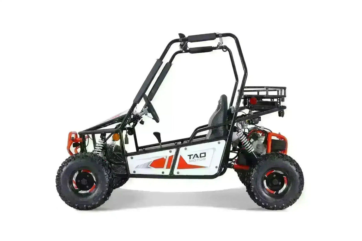 Left-side view of a red and white Triton go-kart showing rear engine, white suspension springs and cargo rack