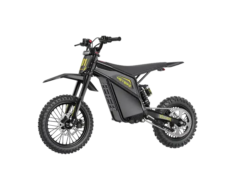 Black electric dirt bike with knobby tires, yellow accents, and modern frame design