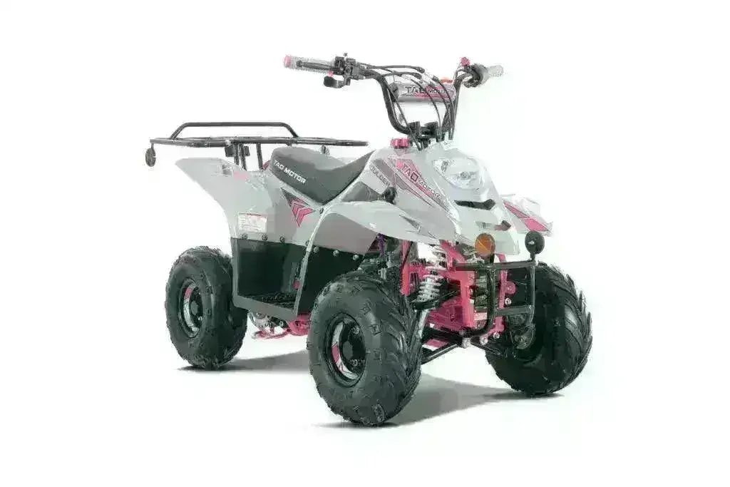 Small 110cc kids ATV in white and pink with rugged tires and front headlight
