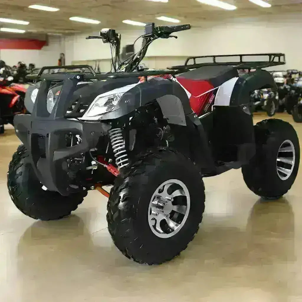 Black and red 200cc utility ATV with large off-road tires displayed indoors