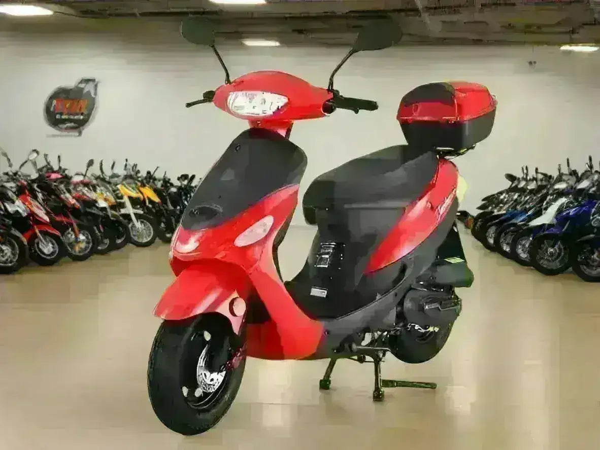 Red 50cc campus cruiser scooter with rear storage box in showroom with other scooters
