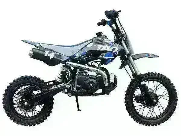 Black and blue 110cc youth dirt bike with off-road tires and number 14 decal