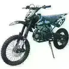 Black DB17 125cc youth dirt bike, front three-quarter view showing engine, front disc brake, and side stand