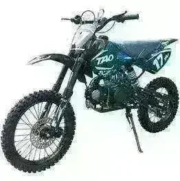 DB17 125cc youth dirt bike, front three-quarter view showing number 17 plate, front suspension, and knobby tires