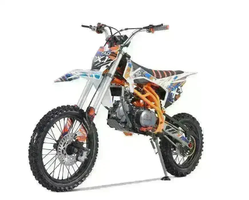 140cc off-road dirt bike with orange frame and bold graphics at Q9 PowerSports USA
