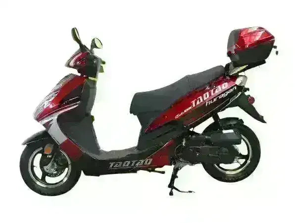Red 50cc scooter with storage trunk, black seat, and alloy wheels, side profile