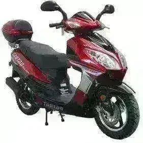 Red 50cc scooter with storage box, street tires, modern sporty design, side view