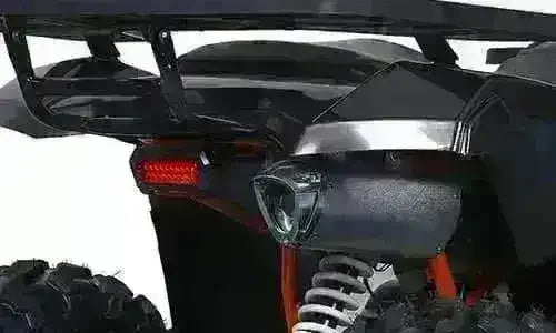 Rear view of black 200cc utility ATV showing taillight, suspension, and rugged tires