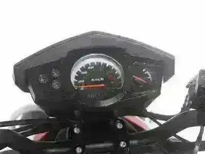 Dashboard and speedometer of a 150cc gas scooter close-up view