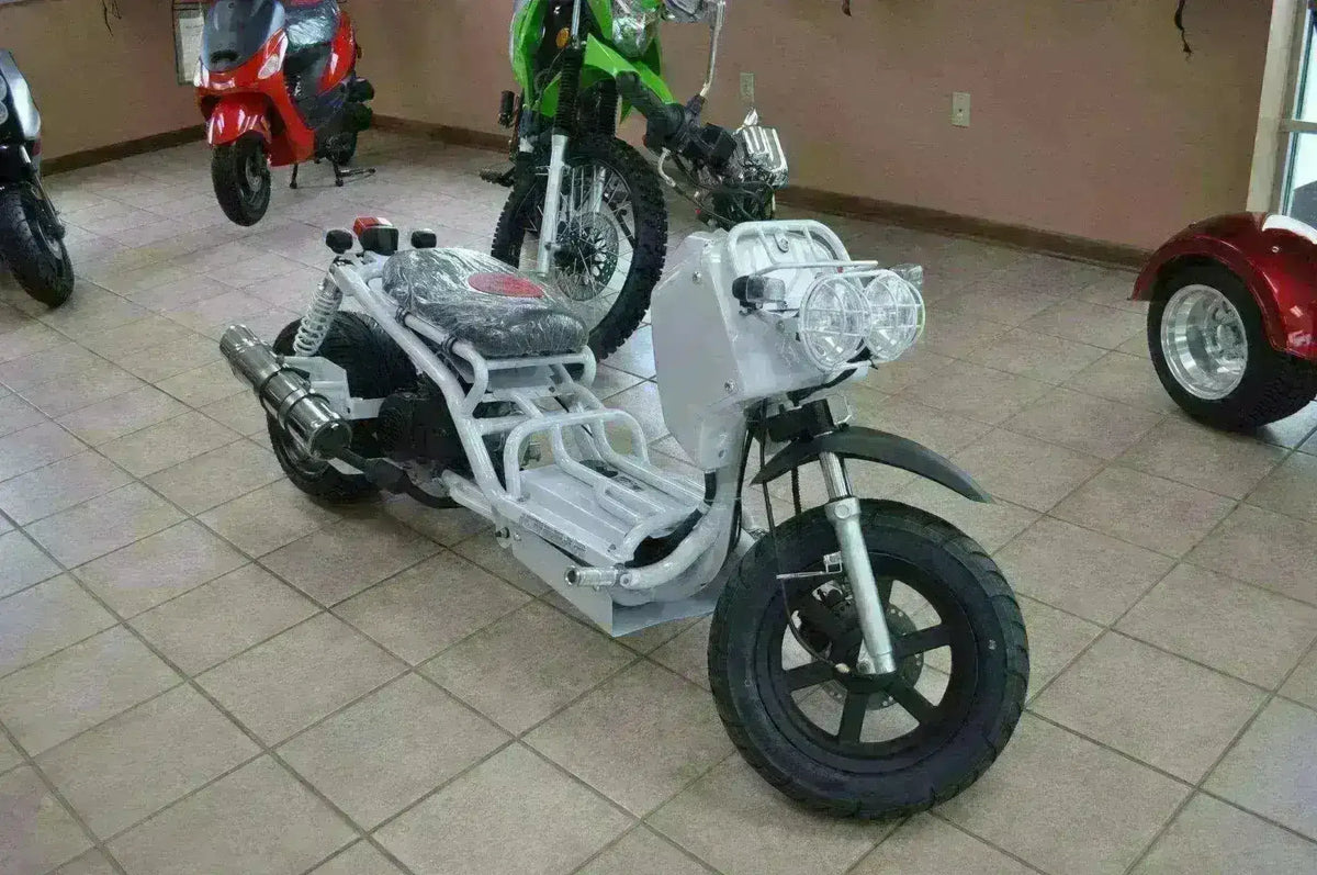 White 150cc Maddog scooter with dual headlights on showroom floor