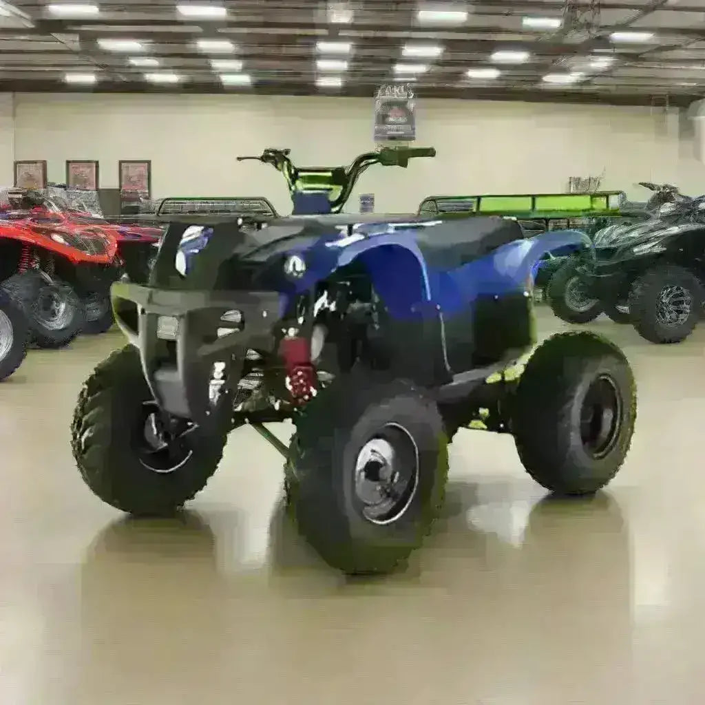 Blue utility ATV four wheeler on showroom floor with other all-terrain vehicles