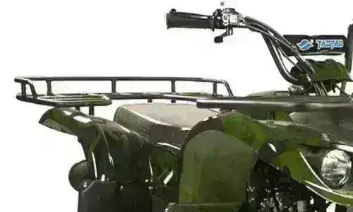 Green utility ATV four-wheeler with front rack and large off-road tires
