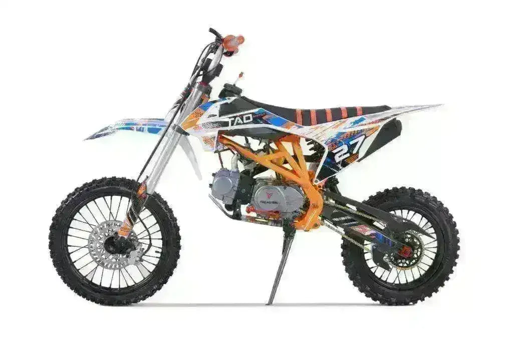 125cc youth dirt bike with graphic decals, number 27, off-road knobby tires