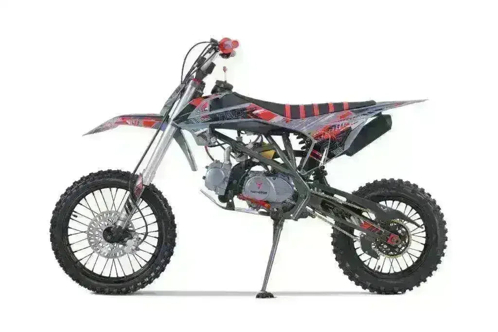 125cc youth dirt bike with knobby tires and red-black graphics on white background