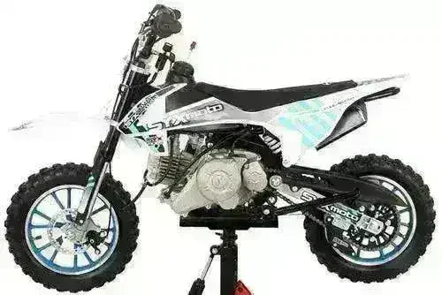 60cc kids pit bike with knobby tires and black-white graphics, side view